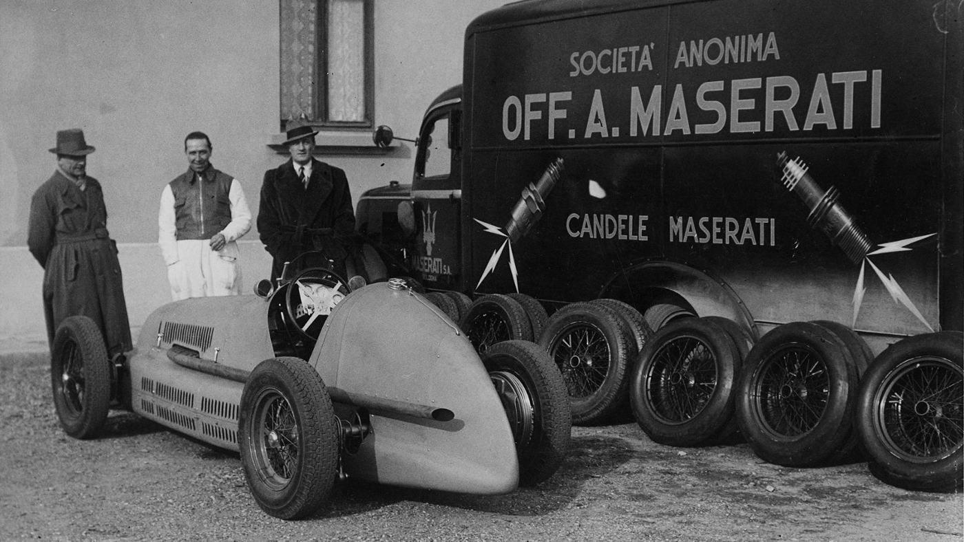 3 Men behind Maserati model during 1950's