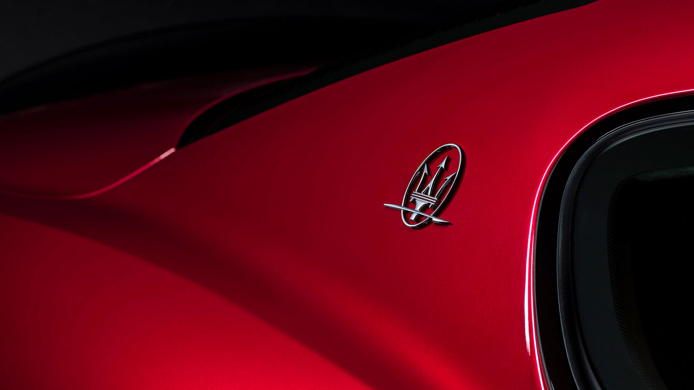 Detail of Maserati logo on GranTurismo