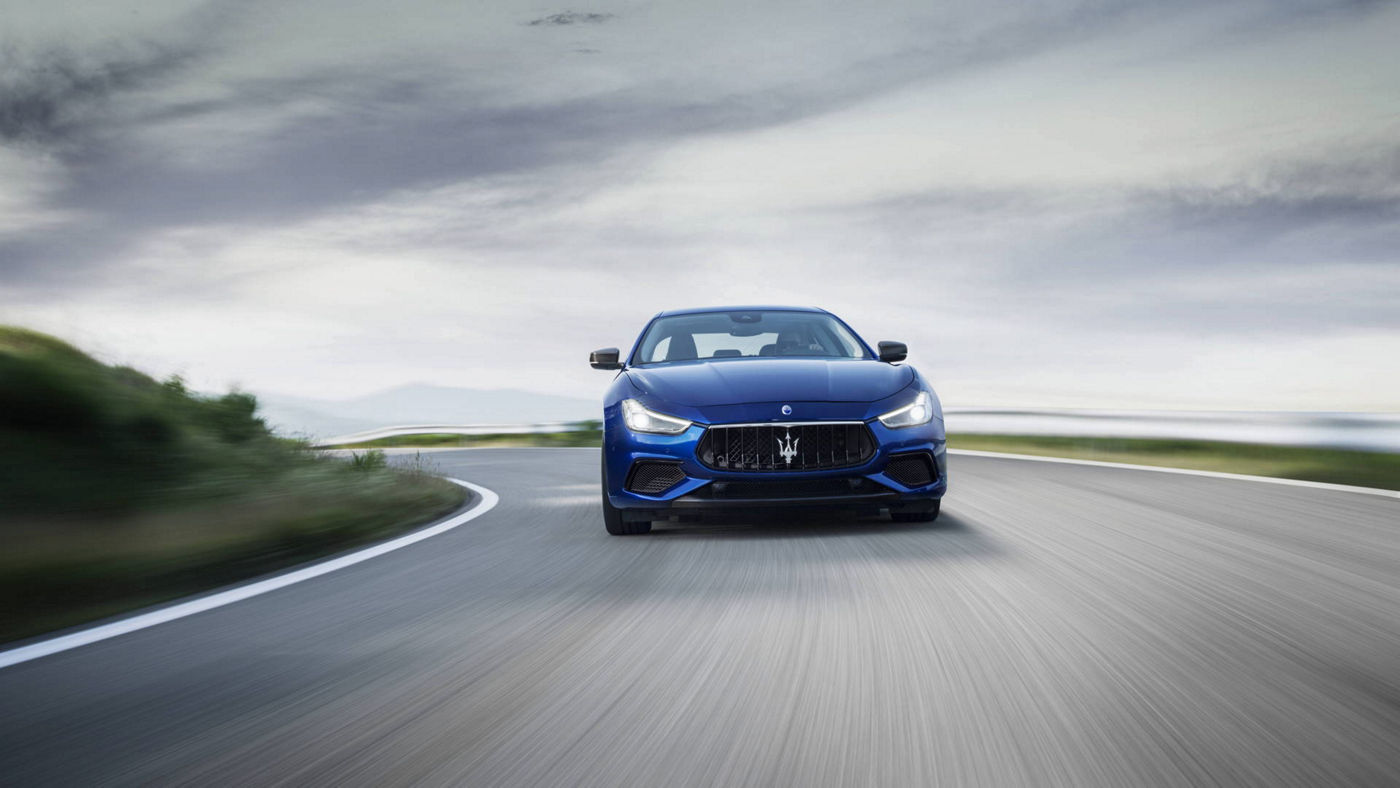 Maserati Ghibli GranSport driving front view, all-wheel-drive system