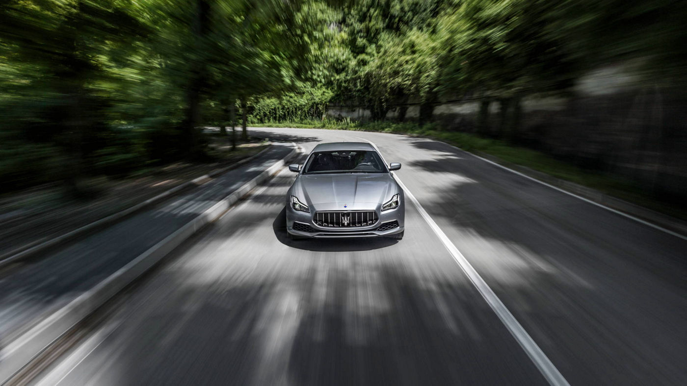 On the road Maserati Quattroporte GranLusso - grey, front view