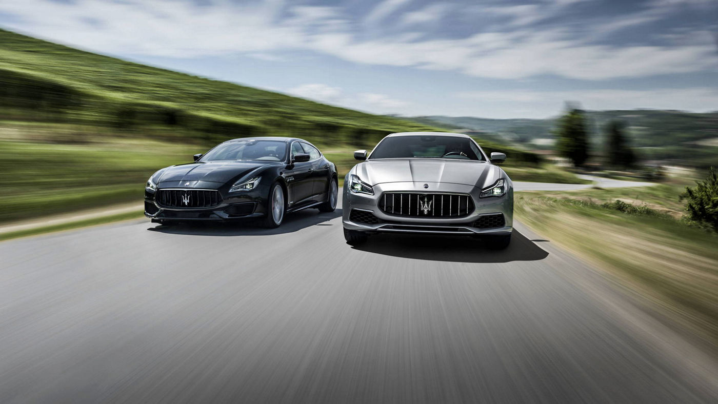 Maserati models - Quattroporte grey luxury cars in motion