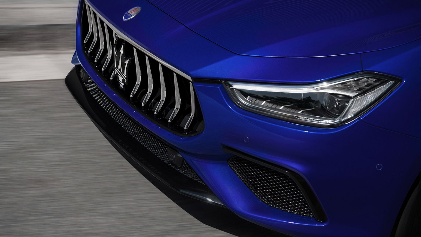 Maserati Ghibli GranSport front view from above, detail of headlights and bumper with logo