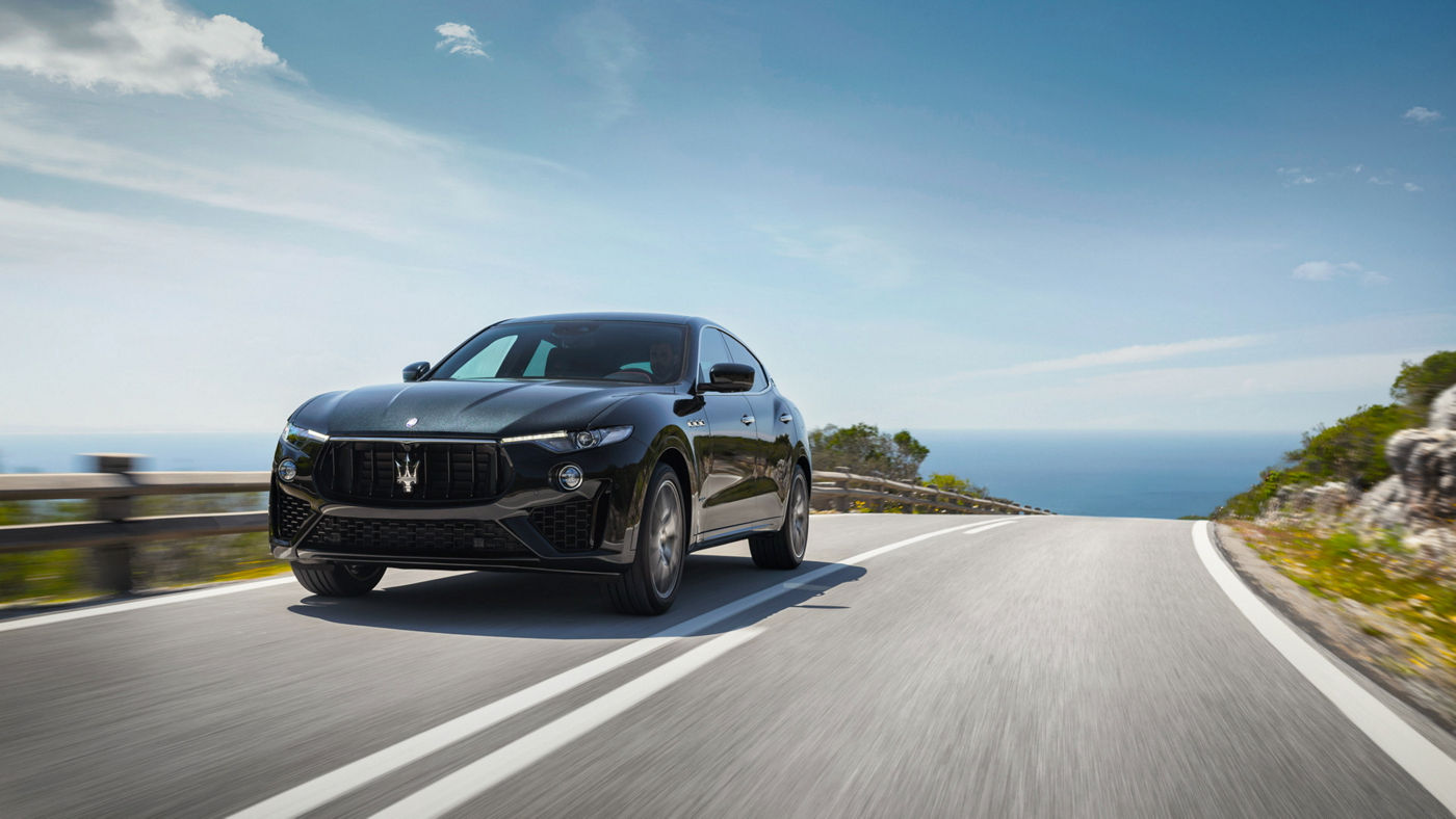 Maserati Levante on the road - seaside background