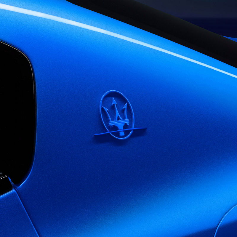 Detail of Maserati logo on Blue F Tributo Special Edition Ghibli