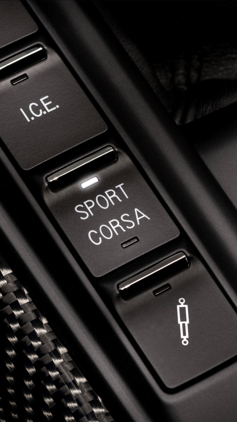 Button to change between "Sport" or "Corsa" mode