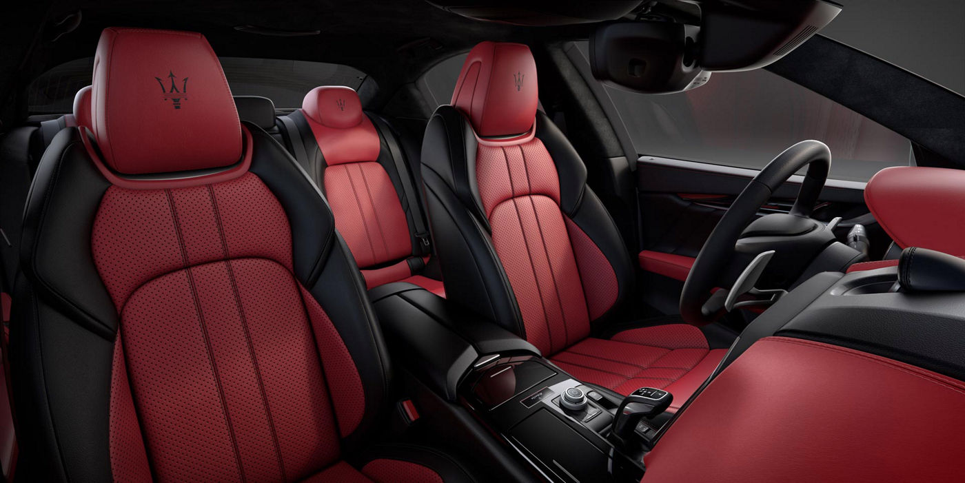 The Sedan Ghibli Ribelle interior details: black and red natural leather seats and central console