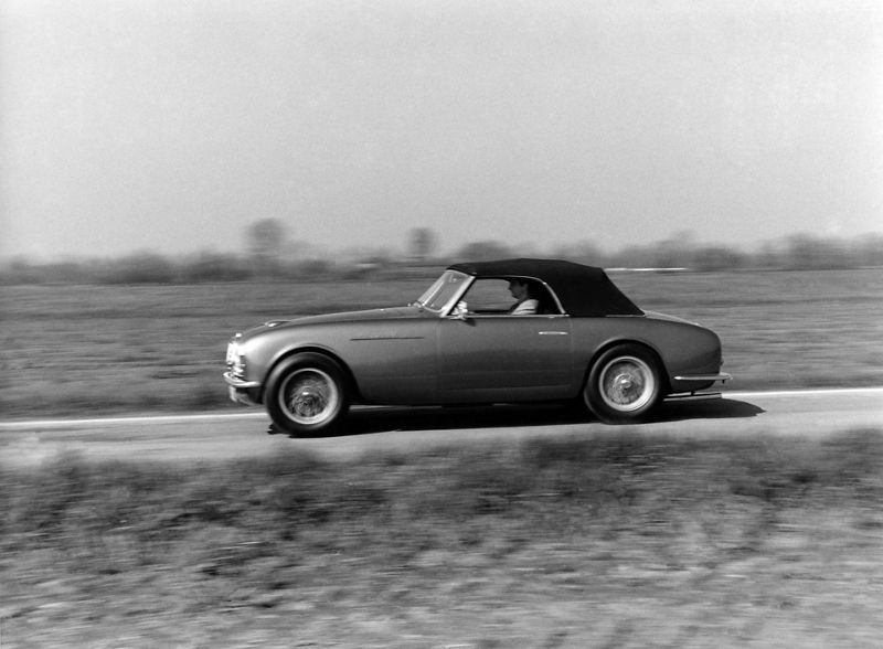 Black and white picture of Maserati A6G on farm road