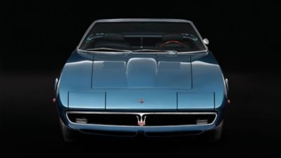 Maserati Ghibli Spyder in aquamarine colour: front view on an abstract black background