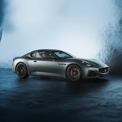 Maserati Granturismo Trofeo 'Winter Edition' seen from the side in a fantasy glacial setting