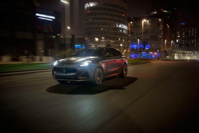 Maserati Grecale travels city streets at night