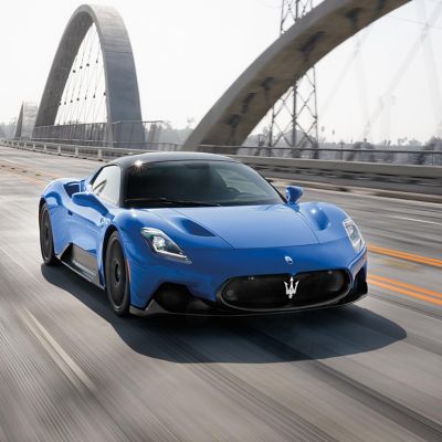 Maserati MC20 moving during the day on a highway