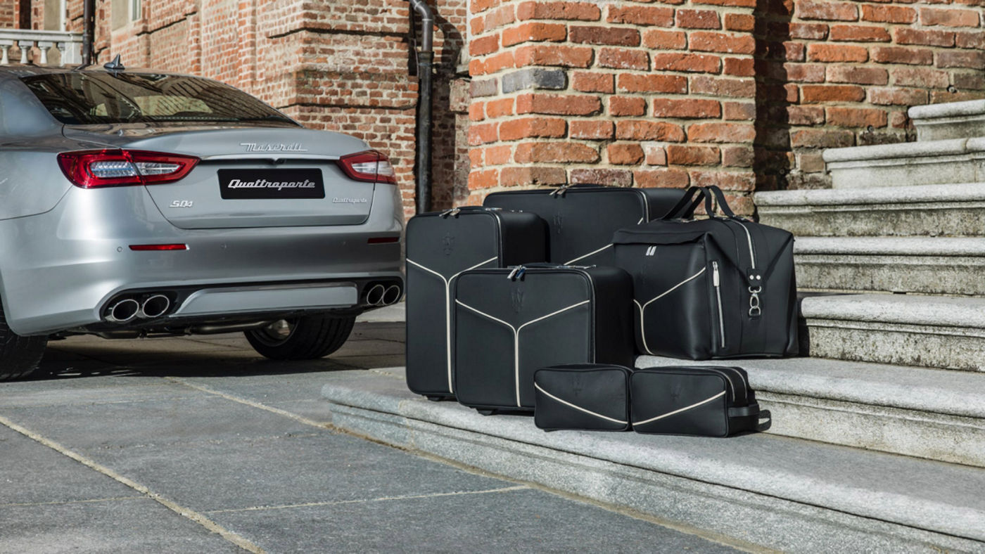 Maserati Quattroporte accessories - luggage set near the car