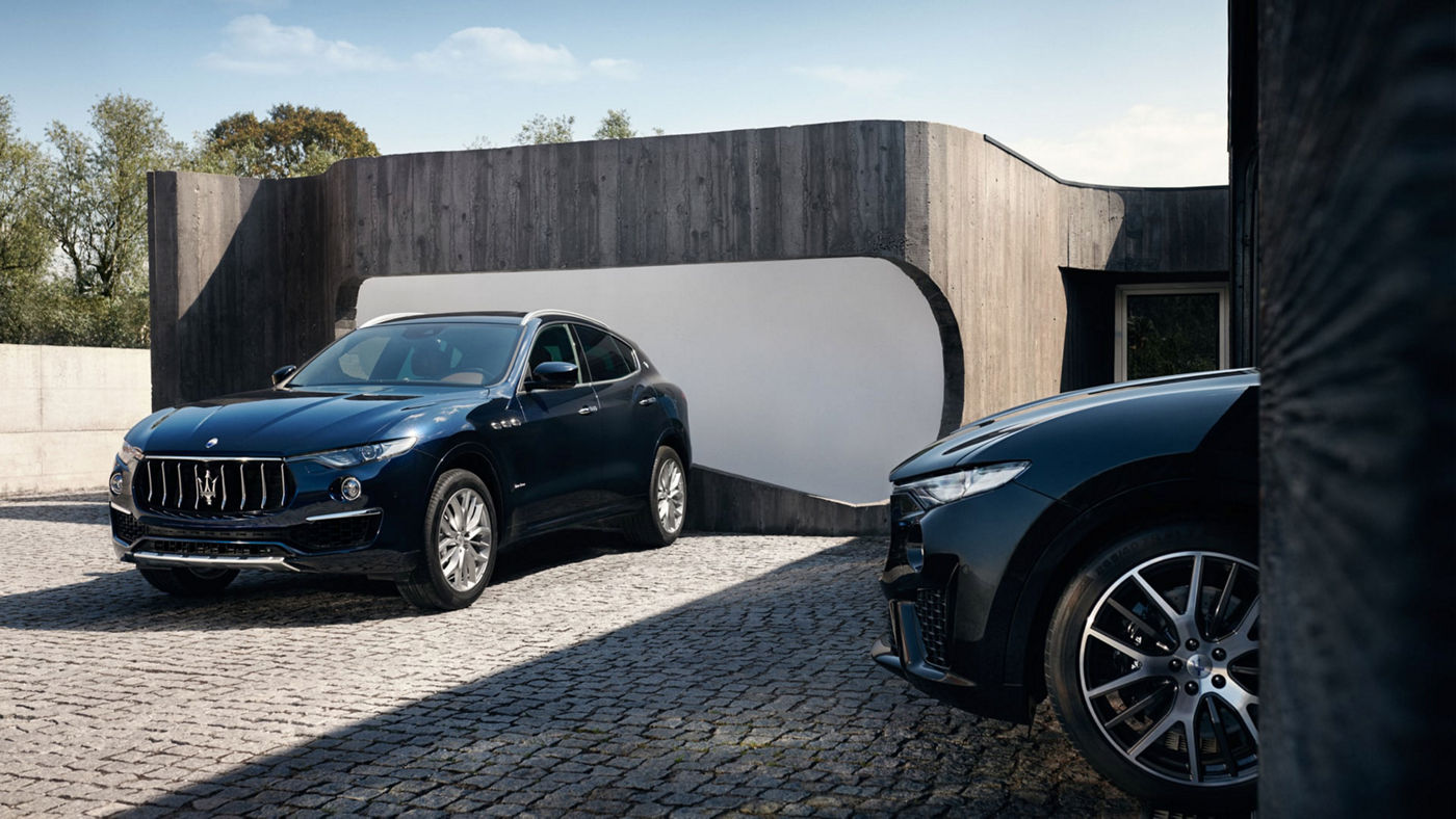 Two Maserati Levante SUVs - front and side view