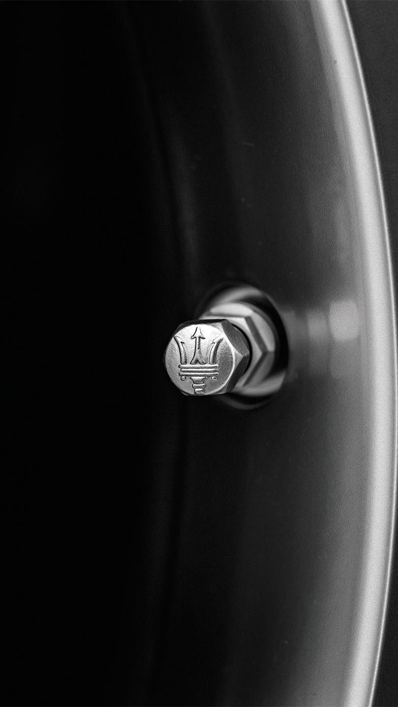 Bolt with Maserati trident logo