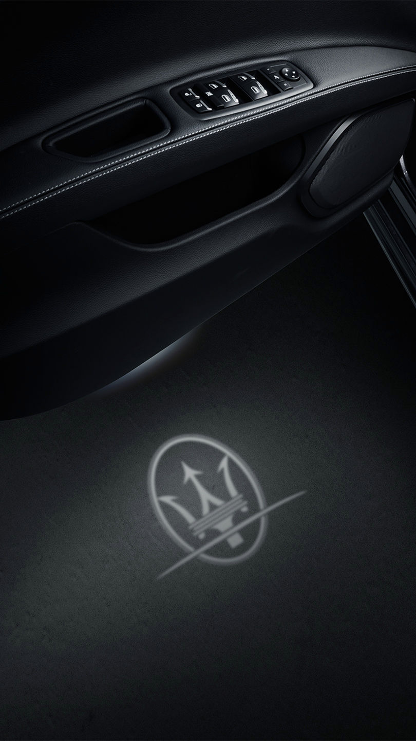 Door sill of Maserati Quattroporte with Trident logo