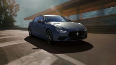 Maserati Ghibli - front view - grey wall on the background