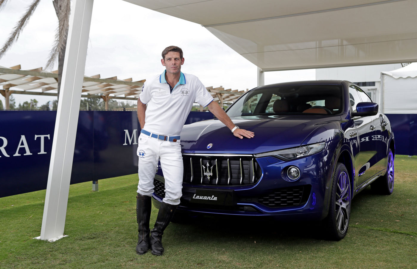 Professional Polo layer Malcolm Borwick with Maserati Levante wearing La Martina Limited Edition Sotogrande Polo shirt