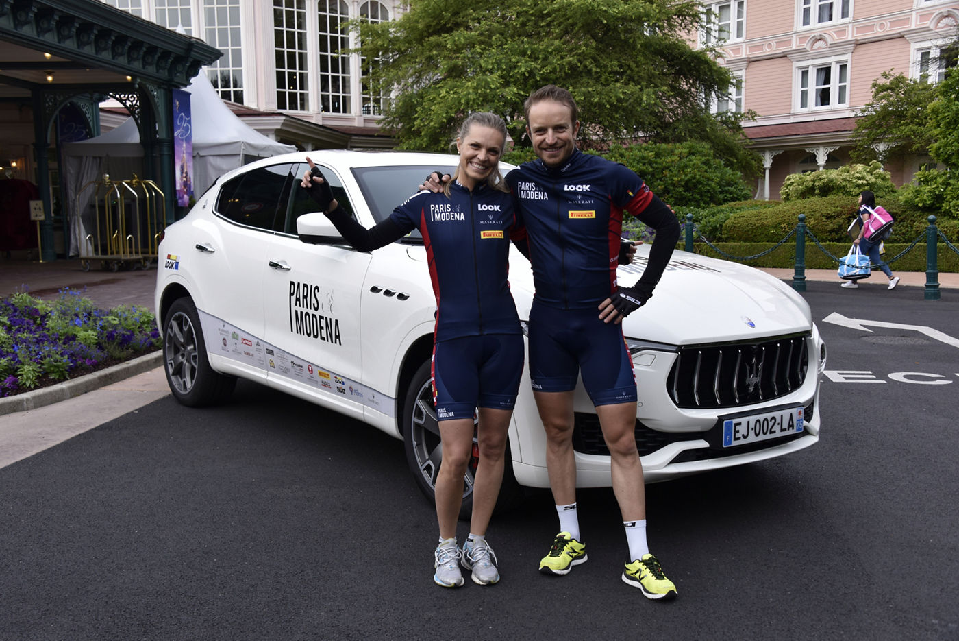 Ski Champions Manuela and Manfred Moelgg with a Maserati Levante