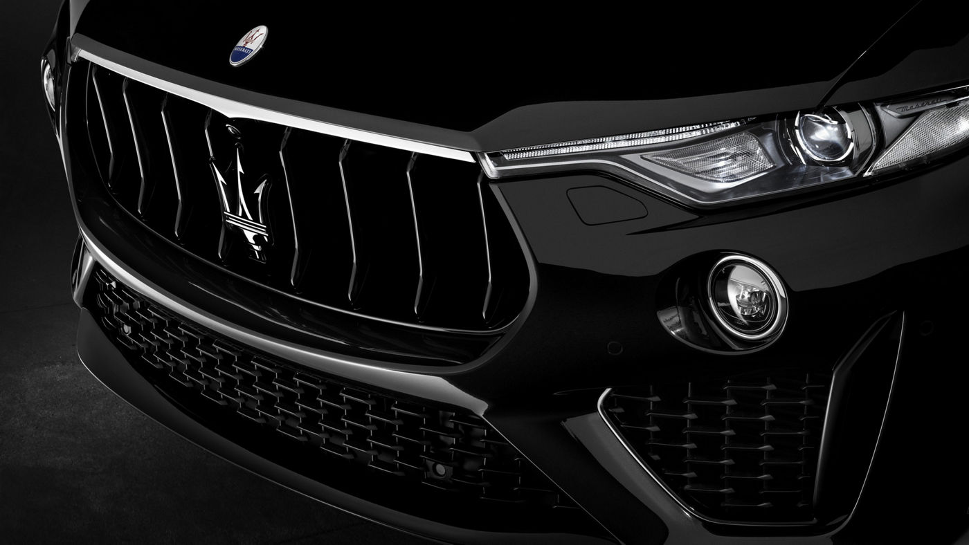 Maserati new models produced in Italy - Front car detail with lights and Maserati logo