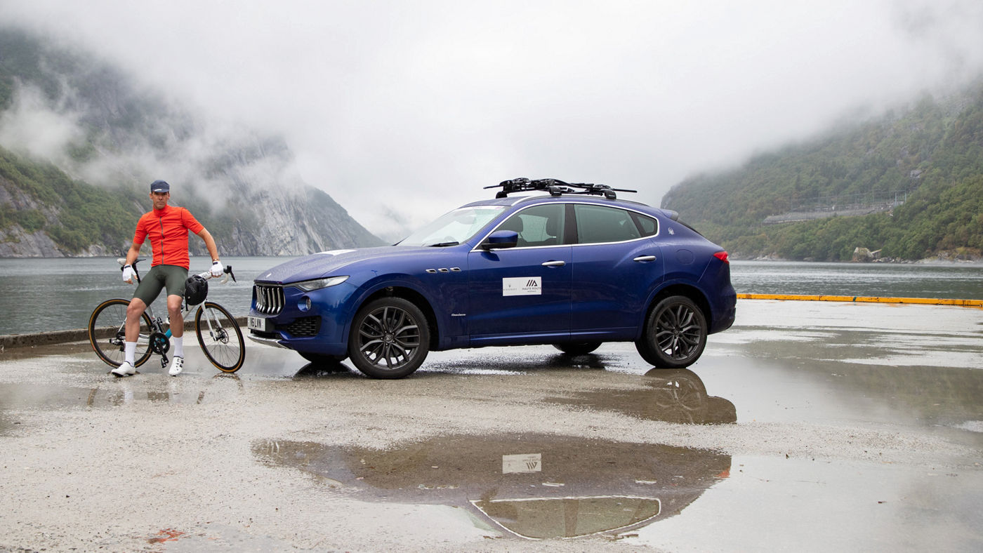Haute Route Norway 2018 - A cyclist and a Levante SUV in the Stavanger region's setting