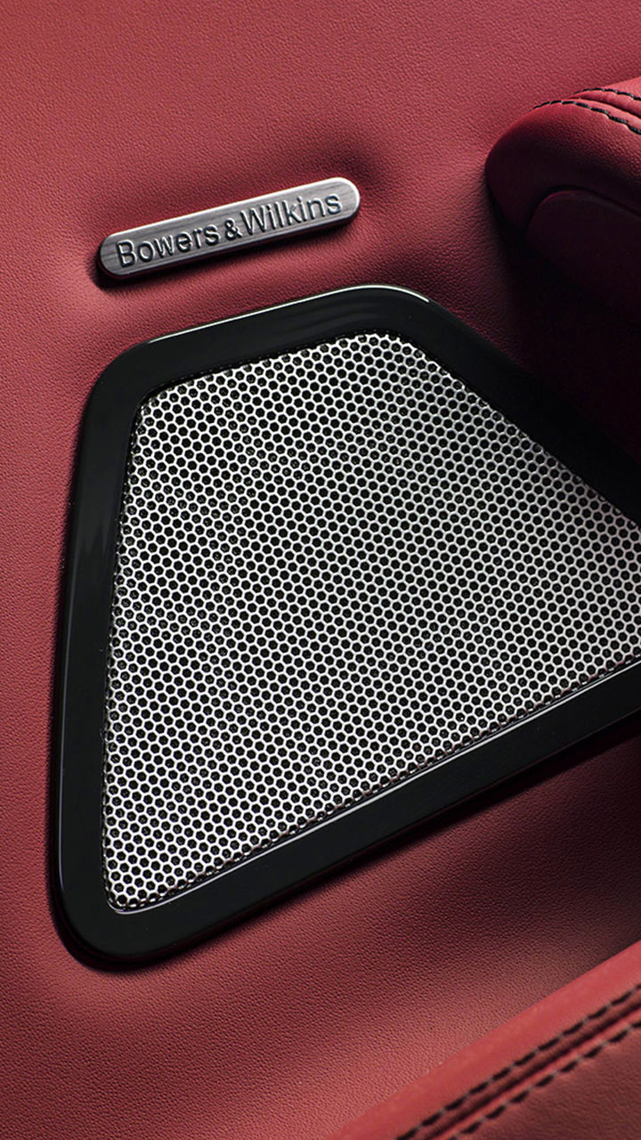 Maserati - Detail of Bowers & Wilkins speaker on red leather