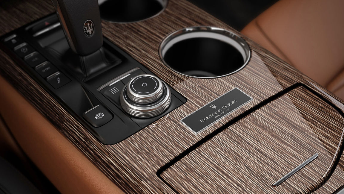 Maserati Quattroporte Edizione Nobile - interior detail with the 'One of 50' badge and oversized cup holders