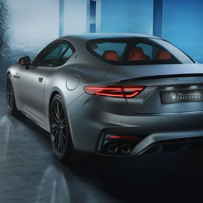 Rear left view of the slate grey Maserati GranTurismo in its new winter version