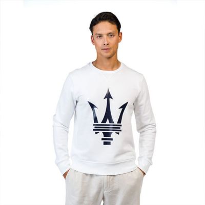 Young man wearing a white unisex sweatshirt with maxi Maserati Trident logo in blue