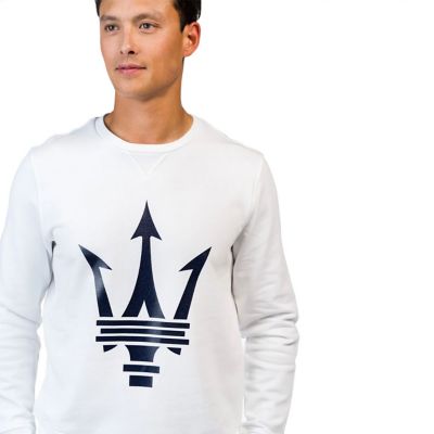 Man with brown hair wearing a white unisex sweatshirt with maxi Maserati Trident logo in blue