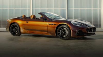 grancabrio-side-view-hero-gold-and-dark-raspberry-desktop