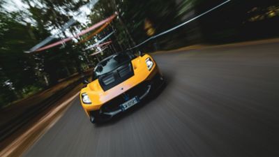 gt2-stradale-yellow-running-hero-desktop