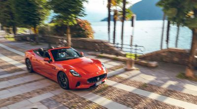 grancabrio-orange-front-view-roadside-assistance-desktop